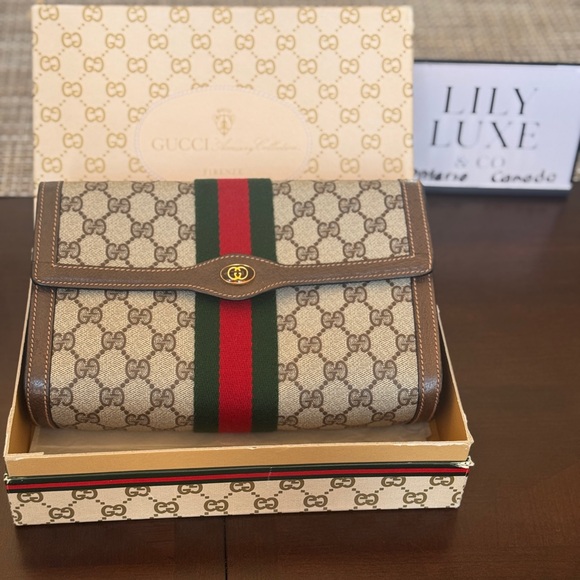 Gucci Handbags - Gucci Beige GG Supreme Canvas Clutch with Red & Green Web Stripe